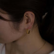 twisted hoop earrings p3